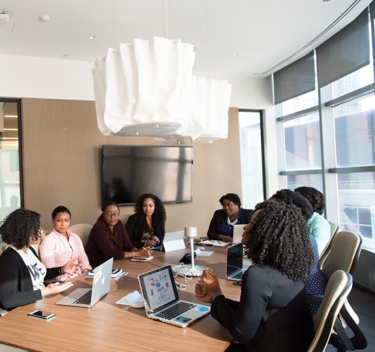 Black professionals collaborating in a meeting